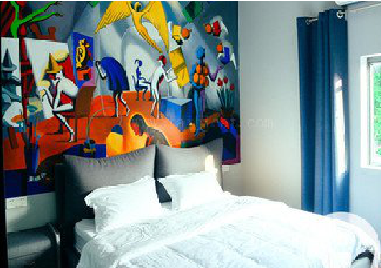 丹巴对于酒店的墙体彩绘而言更注重哪些方面？